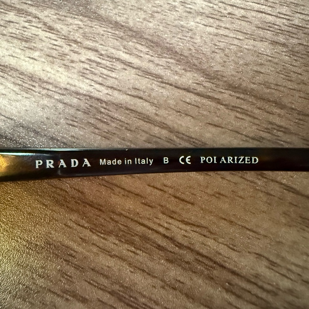 Prada Polarized Women’s Brown and Gold Sunglasses - Picture 4 of 12